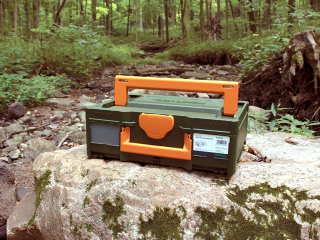 The Festool SYS 3 M 137 Limited-Edition Oudoor Systainer on a rock in the woods.