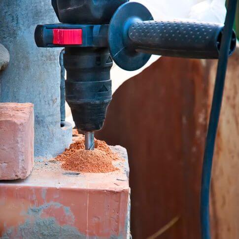 How to drill into brick